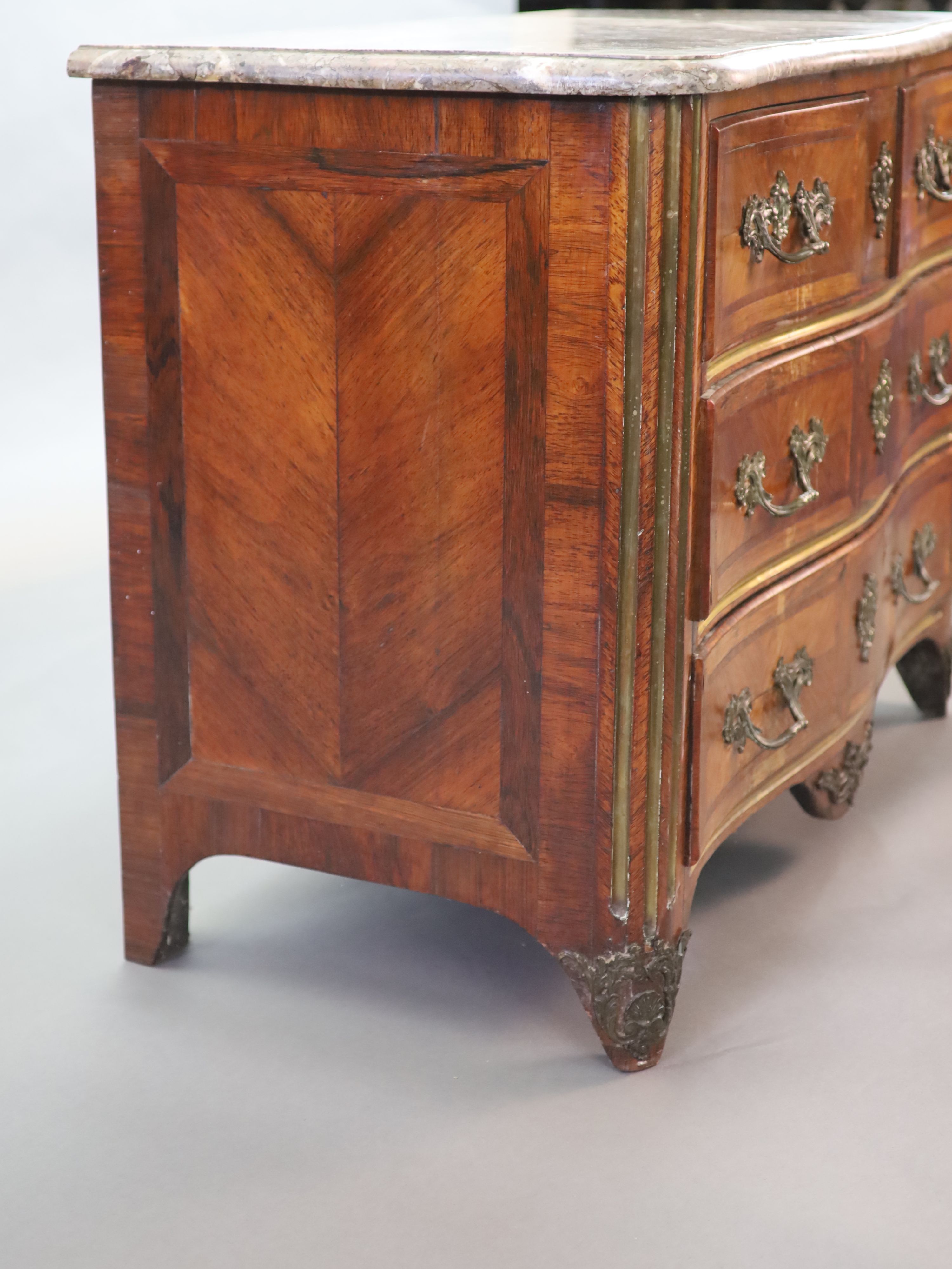 A Louis XVI parquetry serpentine commode, W.113cm D.58cm H.85cm